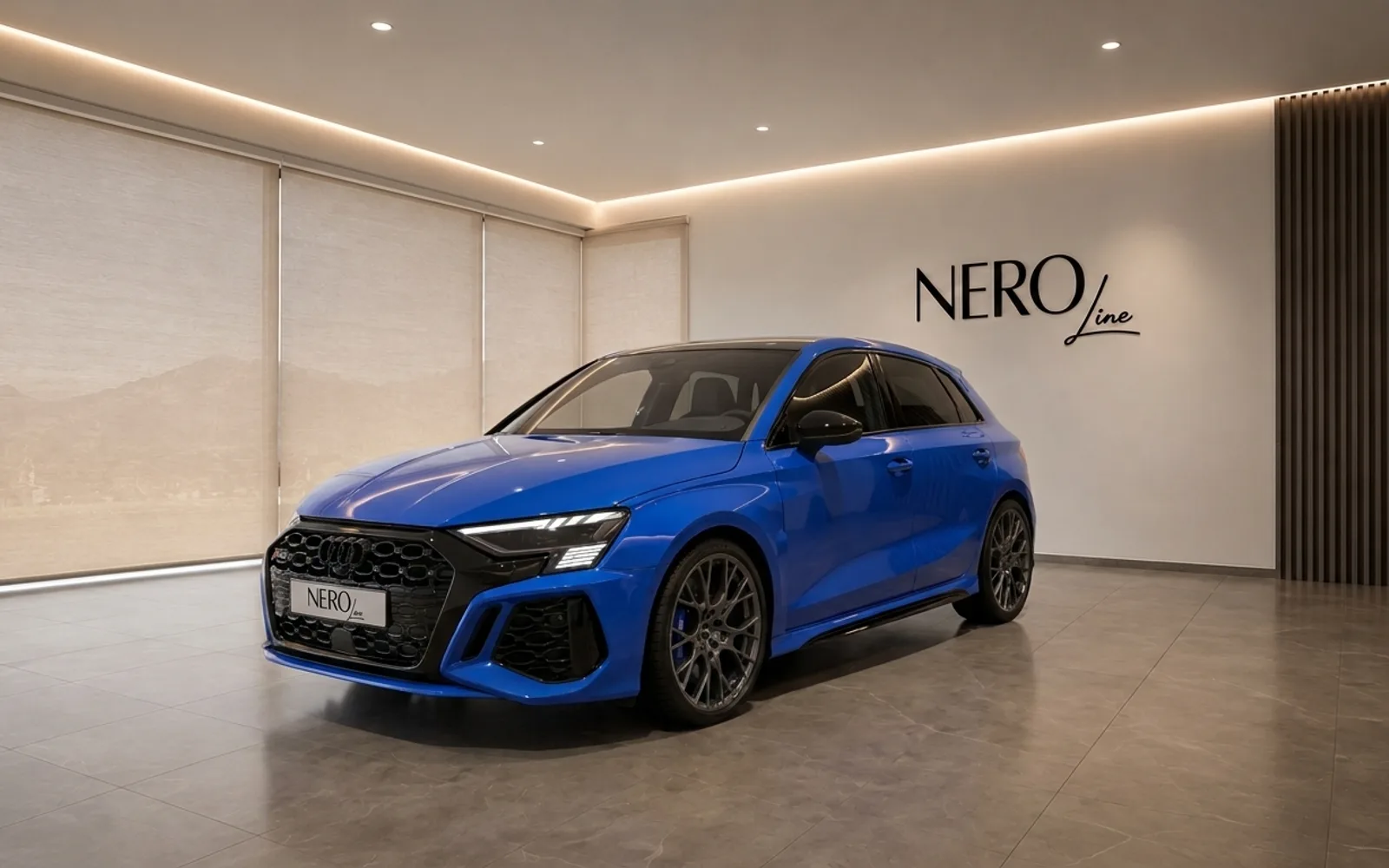 The gloss blue 2023 Audi RS3 Performance Edition is showcased from a front three-quarter view in a modern showroom in Zurich.
