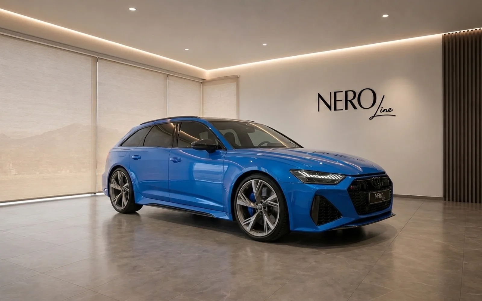 Audi RS6 Avant Performance — Showroom in Zurich The blue Audi RS6 Avant Performance is showcased in a modern Zurich showroom, featuring its front three-quarter view and sleek design.