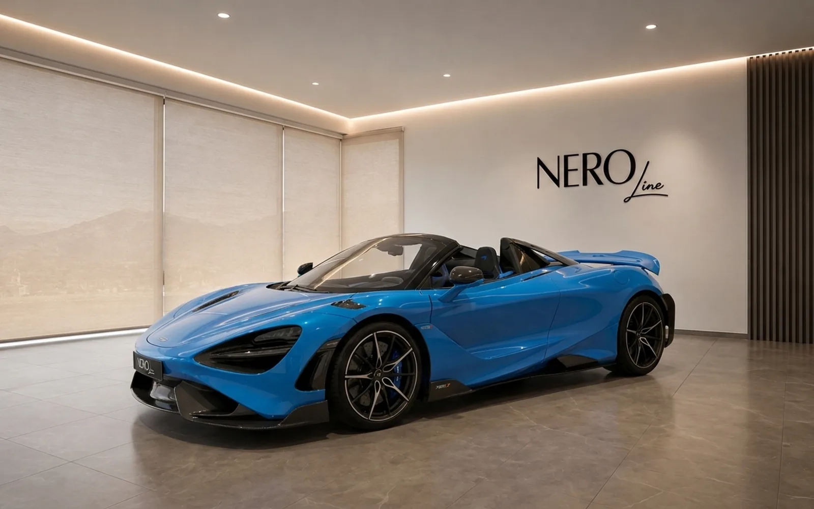 The vibrant blue McLaren 765LT supercar is showcased with its top down in a modern showroom in Lausanne.