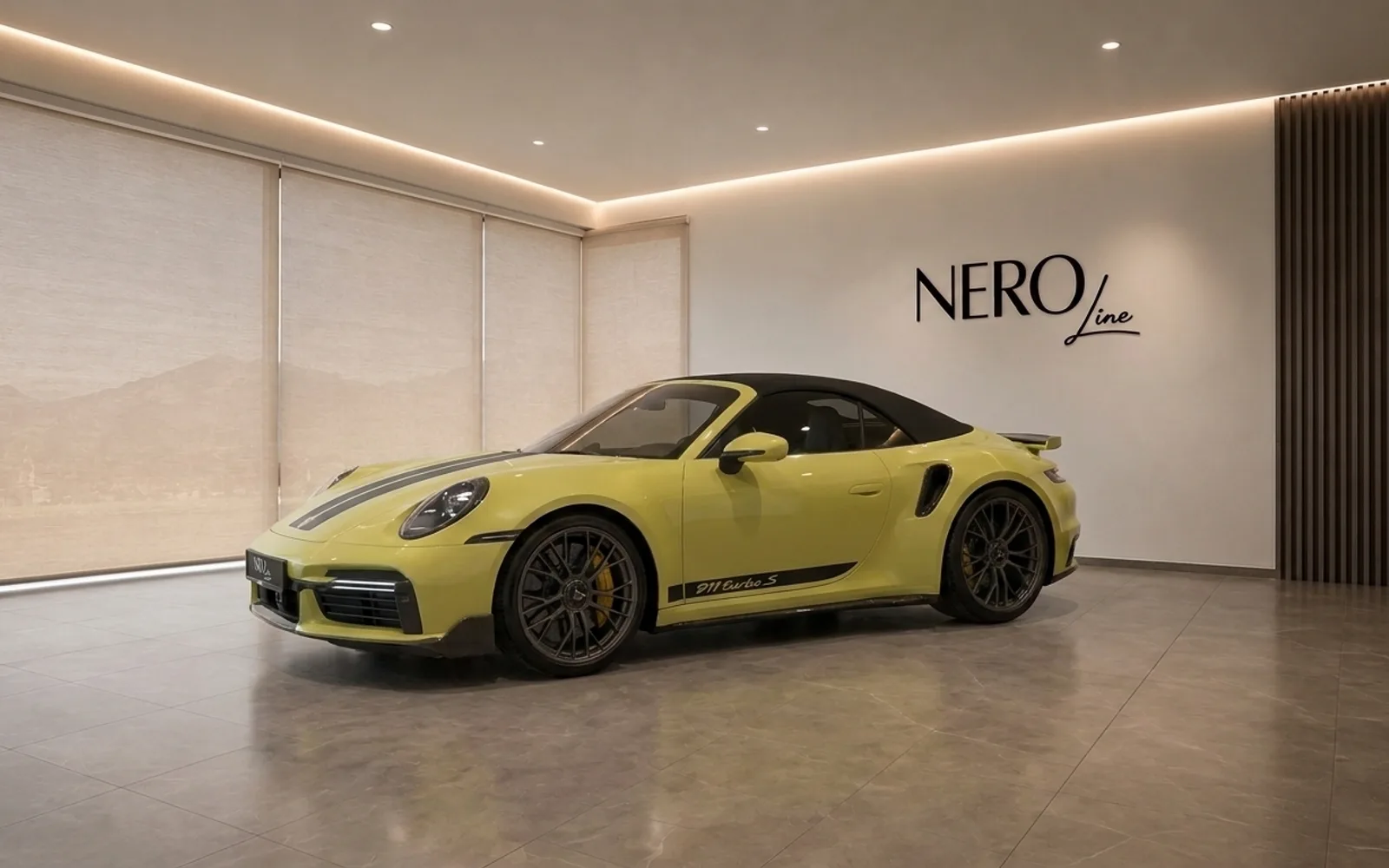The yellow Porsche 911 Turbo S Cabriolet is showcased from the side in a modern Zurich showroom.