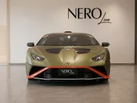 A matte green Lamborghini Huracán STO with orange accents is parked indoors, facing forward, with the NERO line logo visible in Zurich.