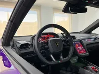 The Lamborghini Temerario's luxurious cockpit in Madrid, showcasing the steering wheel, digital dashboard, and central touchscreen.