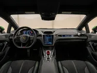 The luxurious interior of the Lamborghini Temerario 2025 in Zurich, featuring the dashboard, steering wheel, and central console with green accents.