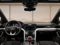 The luxurious interior of the 2019 Lamborghini Urus in Zurich, showcasing its sophisticated dashboard, steering wheel, and central console.