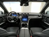 The luxurious interior cockpit of the 2024 Mercedes-Benz C63 AMG in Alicante, featuring its advanced digital dashboard and central infotainment screen.