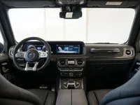 The luxurious interior of the 2019 Mercedes-Benz G63 Brabus, showcasing the dashboard, steering wheel, and front seats in Lausanne.