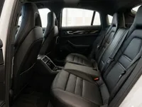 The luxurious black leather rear seats and interior of the Porsche Panamera 4S E-Hybrid in Lausanne.