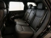 Land Rover Range Rover Sport's luxurious black leather rear seats and spacious interior are visible in Lausanne.