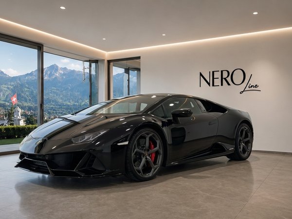 Lamborghini Huracan EVO LP640 — Indoor showroom, Zurich A black Lamborghini Huracan EVO LP640 is parked indoors, showcasing its sleek design against a stunning Zurich mountain landscape.