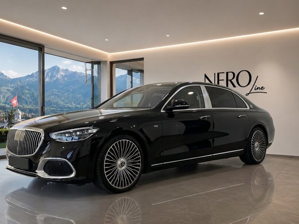 Mercedes S680 Maybach — Luxury Showroom Zurich The black Mercedes S680 Maybach is showcased in a modern showroom with a panoramic view of the Swiss mountains in Zurich.