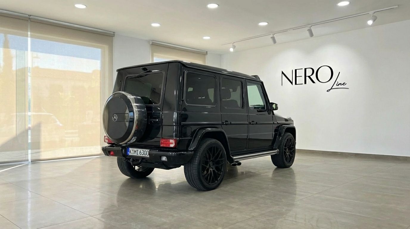 The black Mercedes-Benz G-Class Brabus G800 Rocket is showcased from a rear three-quarter view in an Alicante showroom.