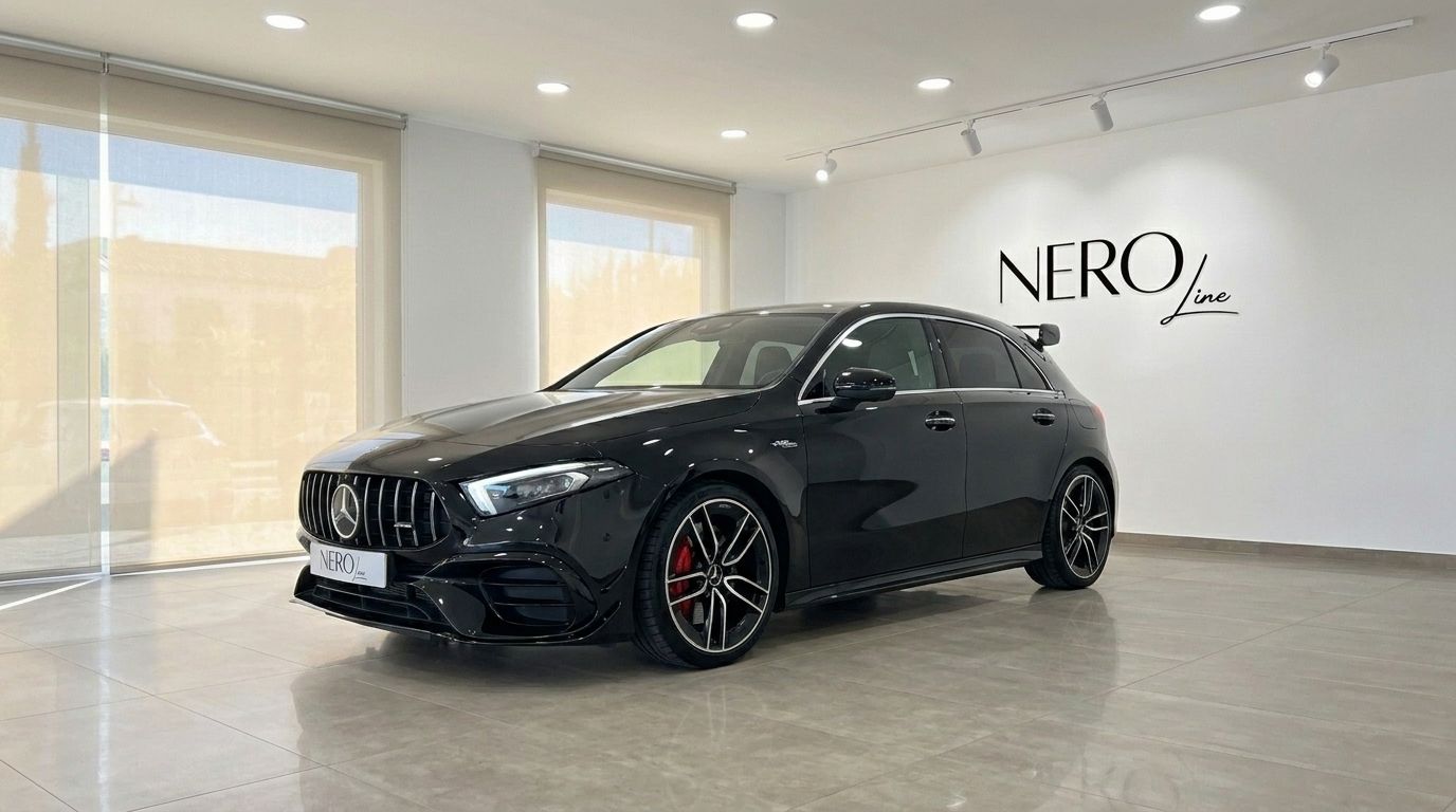 The gloss black Mercedes-Benz A 35 AMG is showcased in a showroom with large windows in Alicante.