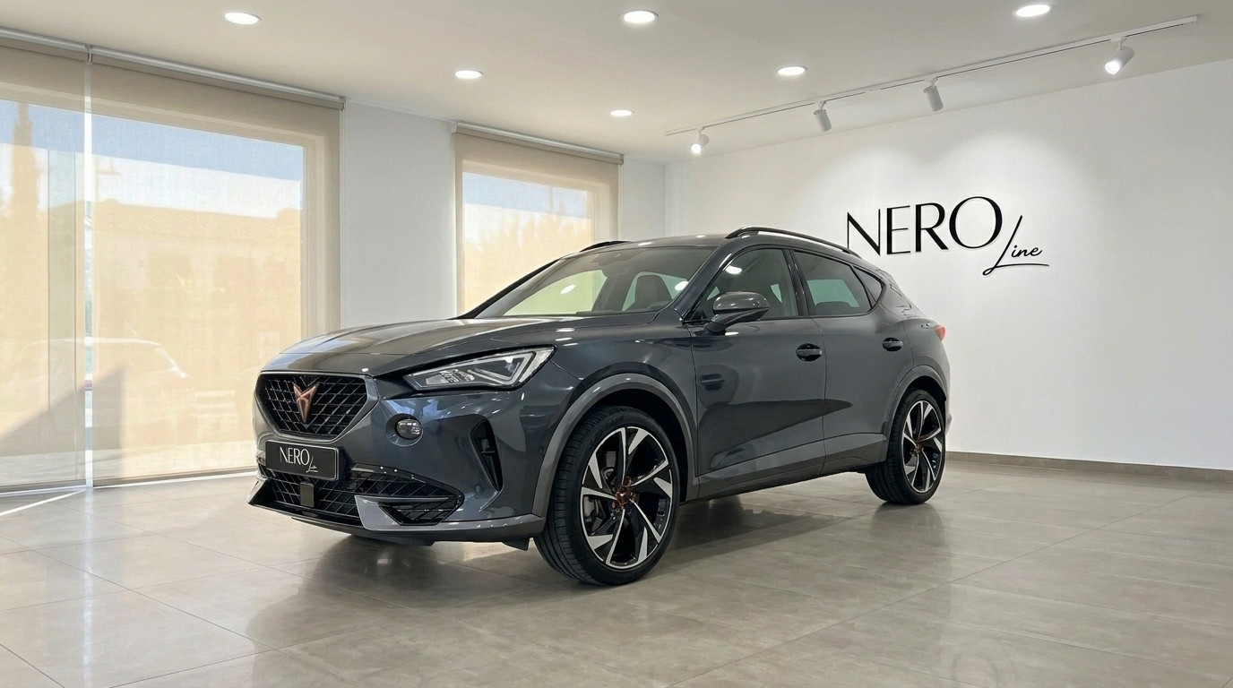 Cupra Terramar — Front three-quarter view in showroom A gloss dark grey metallic Cupra Terramar SUV is showcased from a front three-quarter angle in a bright Alicante showroom.