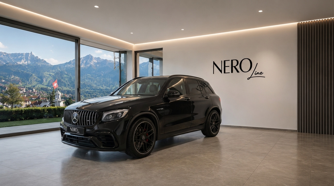 Mercedes-Benz GLC 63 AMG — Showroom in Zurich A black Mercedes-Benz GLC 63 AMG SUV is parked in a modern showroom with a stunning mountain view of Zurich.