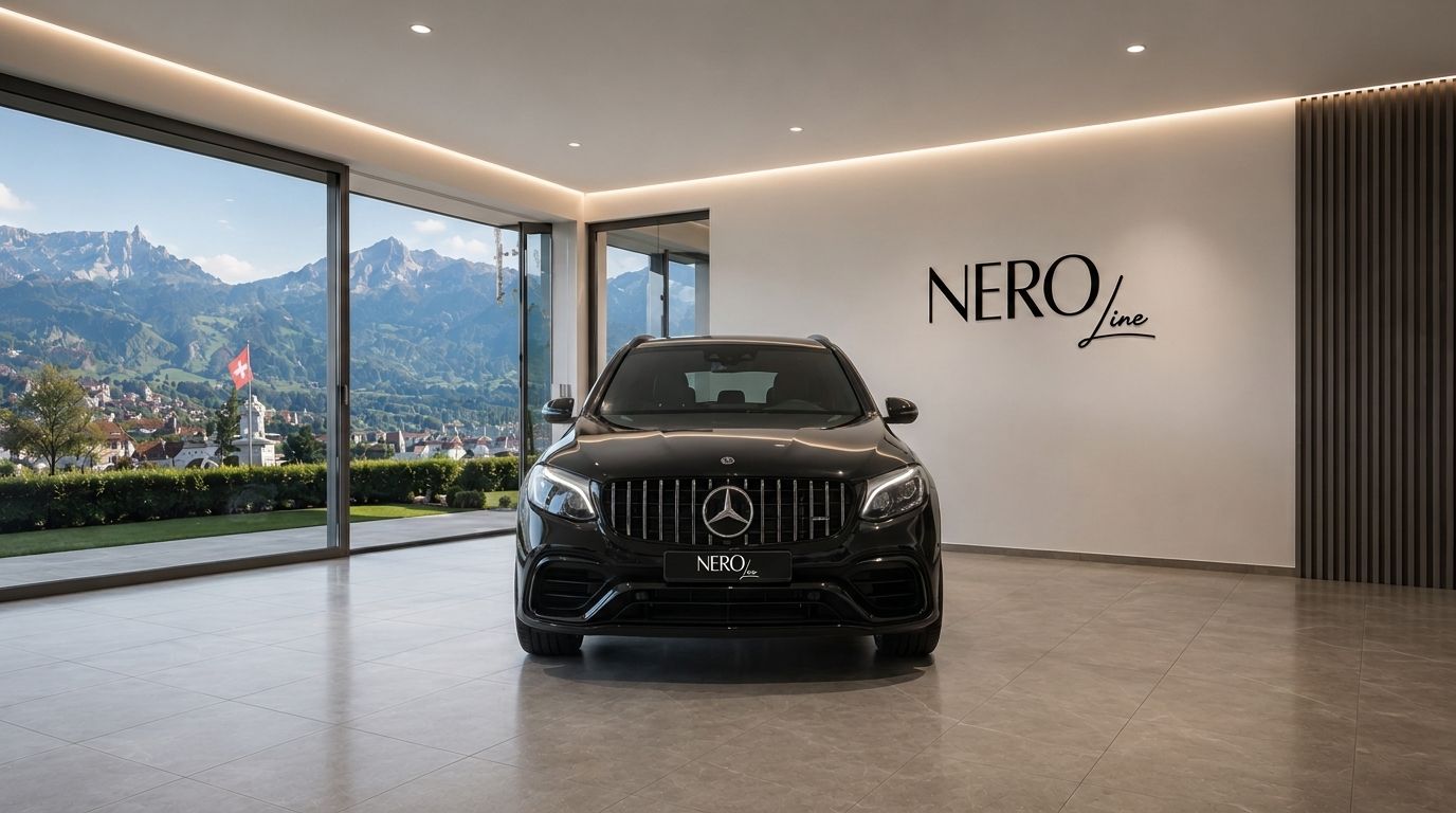 A black Mercedes-Benz GLC 63 AMG is parked front-on in a modern Zurich showroom with a panoramic mountain view.