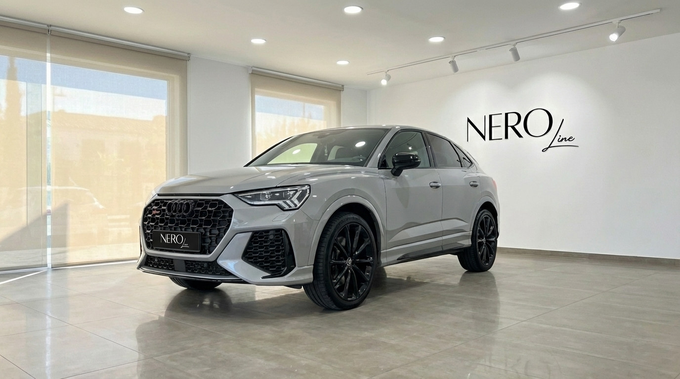 Audi RSQ3 — Luxury Performance SUV in Barcelona The metallic silver 2023 Audi RSQ3 is showcased from a front three-quarter angle indoors in Barcelona.