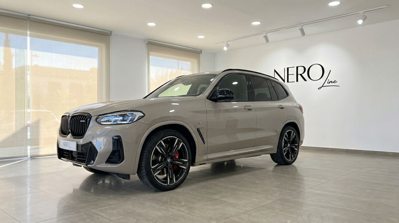 The Gloss Dune Grey 2025 BMW X3 M50i xDrive is shown from a front three-quarter angle in a showroom in Marbella.