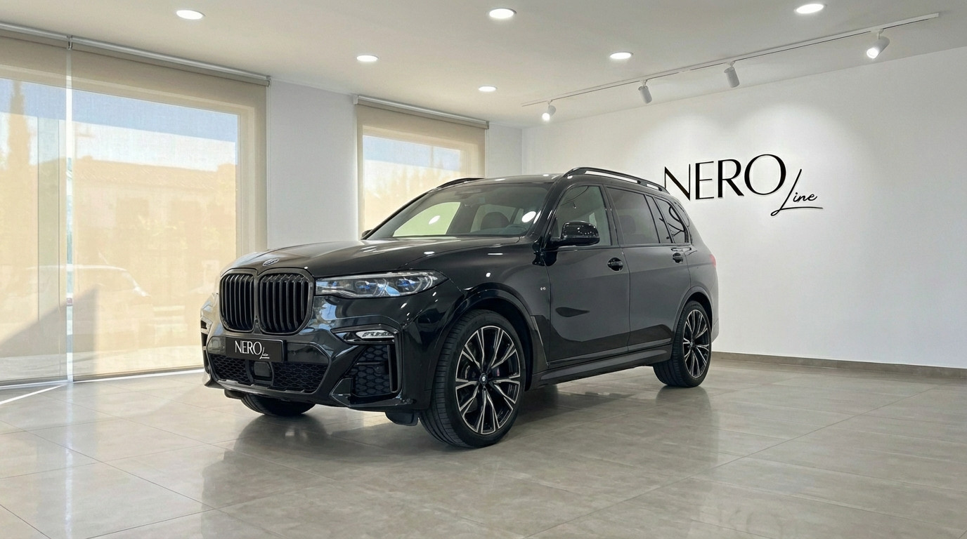 BMW X7 M50i Special Edition — Front view Alicante A black 2025 BMW X7 M50i Special Edition SUV is parked indoors, showcasing its front three-quarter view in Alicante.
