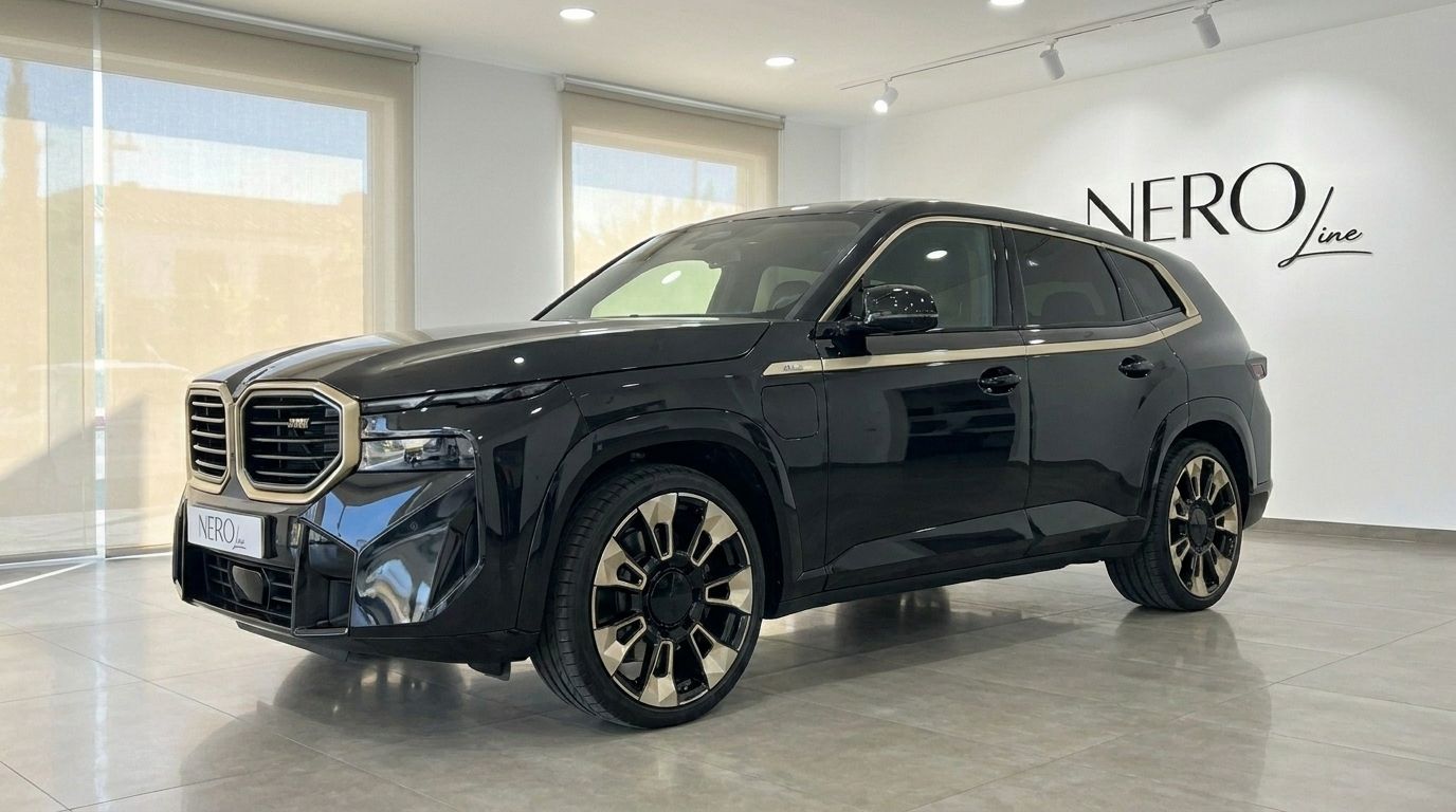 The 2025 BMW XM, a gloss black performance SUV, is showcased from a front three-quarter angle in a showroom in Alicante.