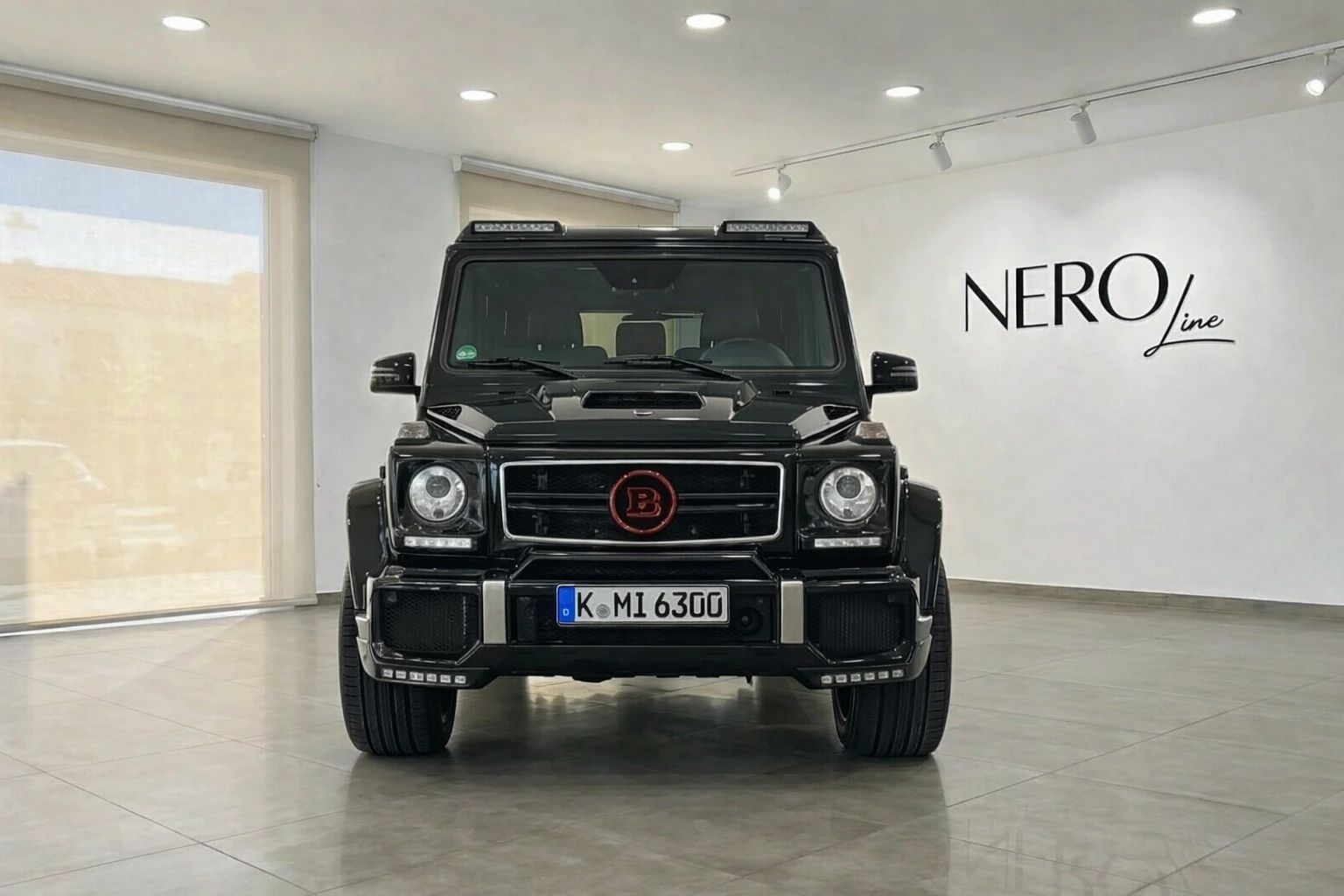 The black Brabus G800 Rocket, a Mercedes-Benz G-Class, is prominently displayed from a direct front view in Alicante.