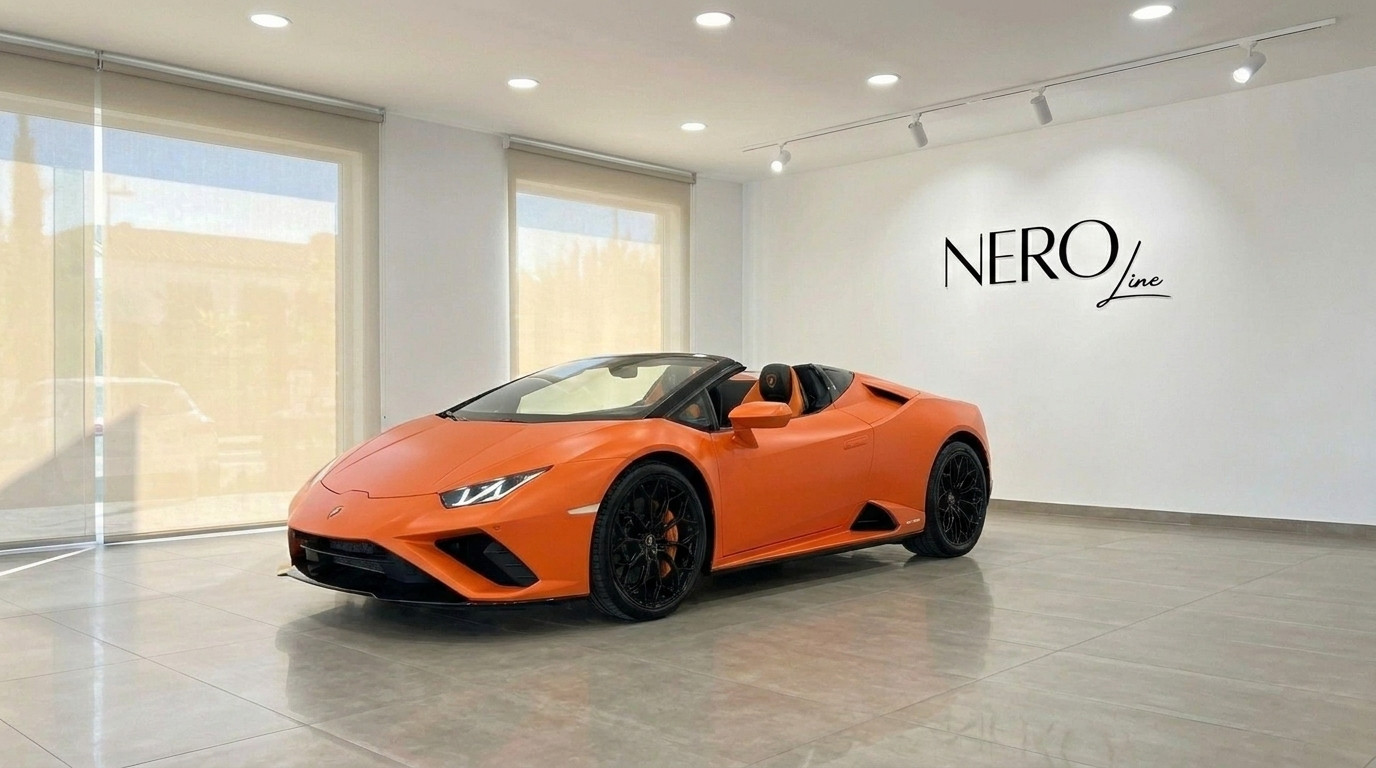 Lamborghini Huracan Evo Spyder — Barcelona Showroom The orange Lamborghini Huracan Evo Spyder convertible is showcased from the front-side in a bright showroom in Barcelona.