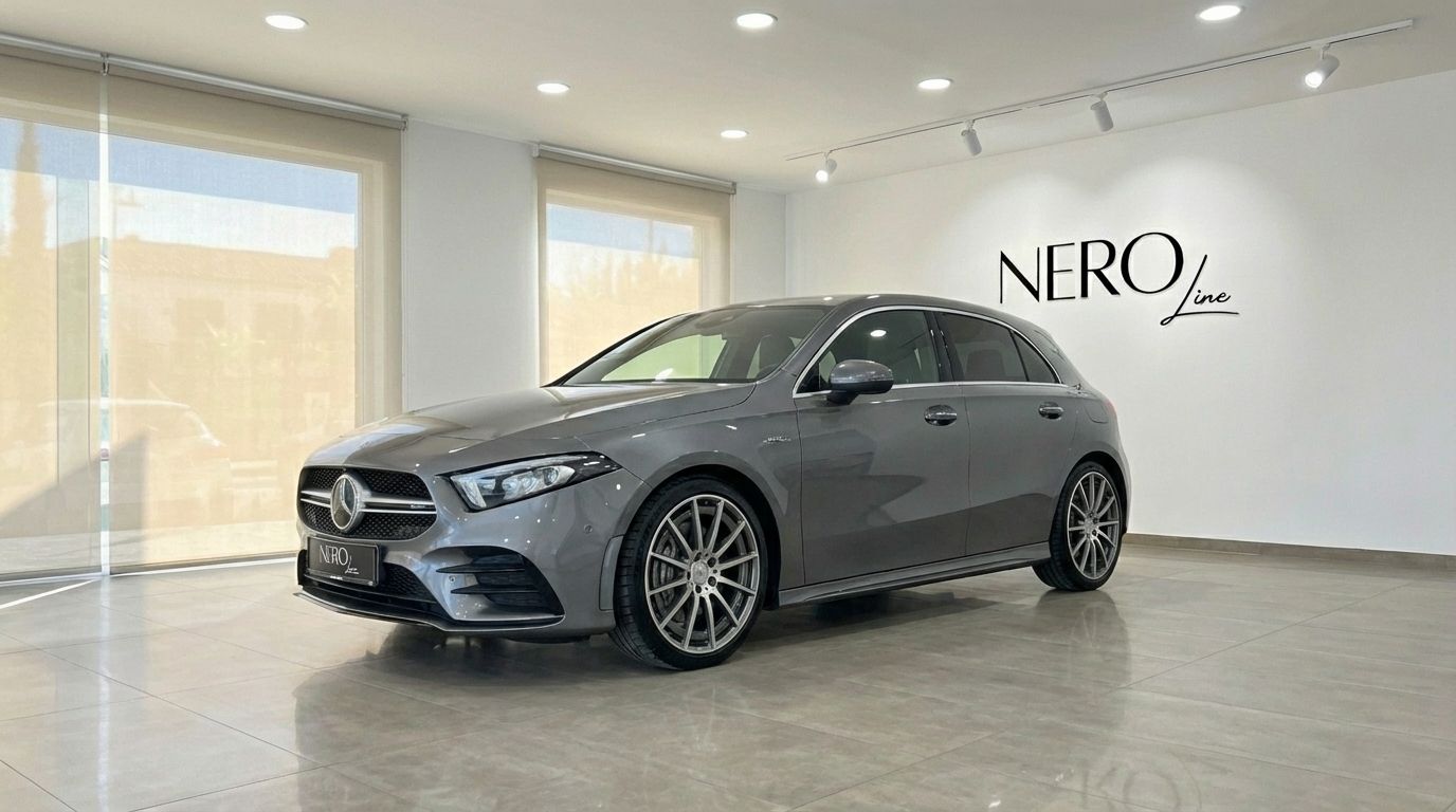 The metallic grey 2022 Mercedes-Benz A 45 AMG is showcased from a front three-quarter view in a showroom in Alicante.