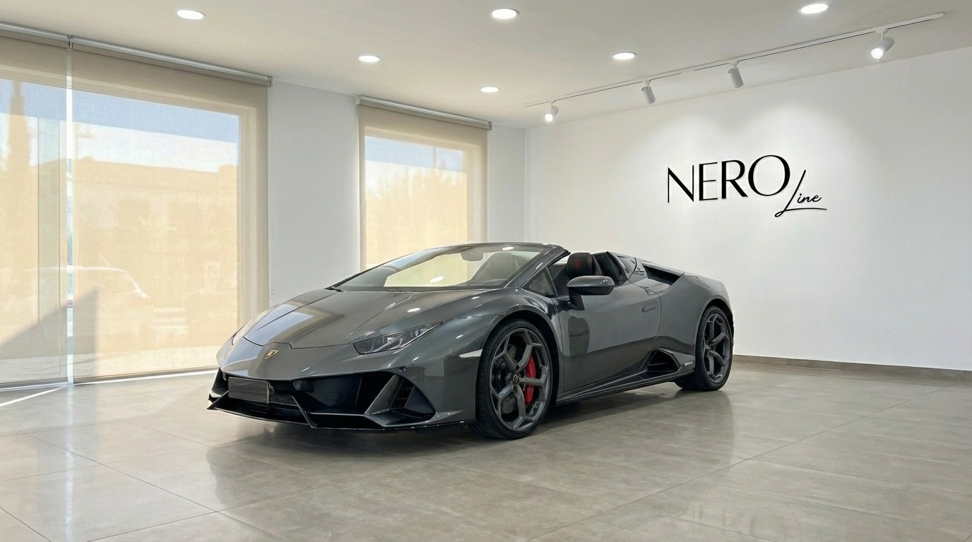 Lamborghini Huracan Evo Spyder — Showroom view A metallic grey Lamborghini Huracan Evo Spyder convertible is parked in a modern showroom with the NEROline logo in Barcelona.
