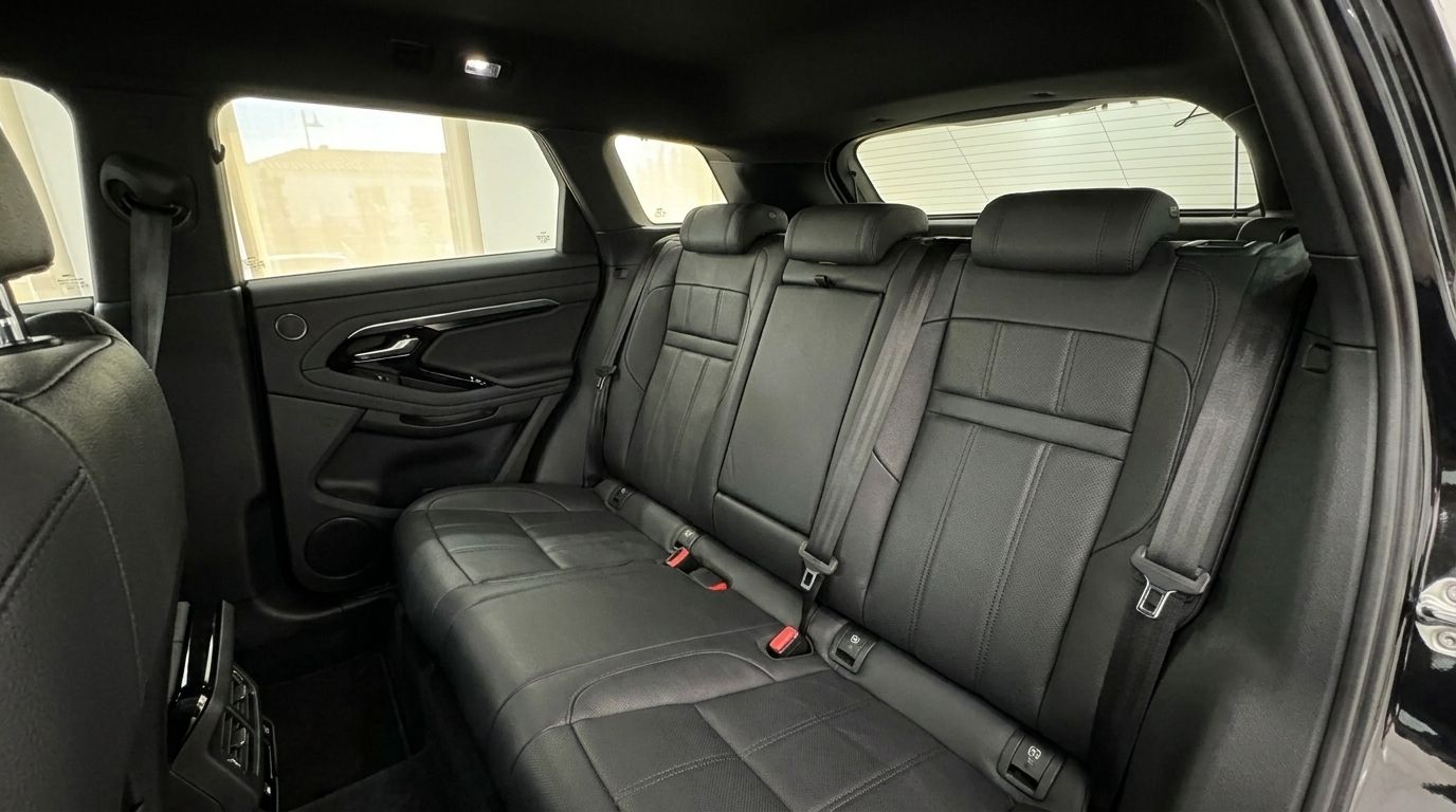The luxurious black leather rear seats and interior of the Land Rover Range Rover Evoque R-Dynamic in Alicante.
