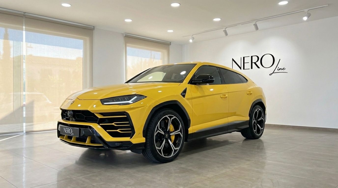 The glossy yellow Lamborghini Urus, a performance SUV, is showcased in a showroom with the Nero Line logo in Marbella.