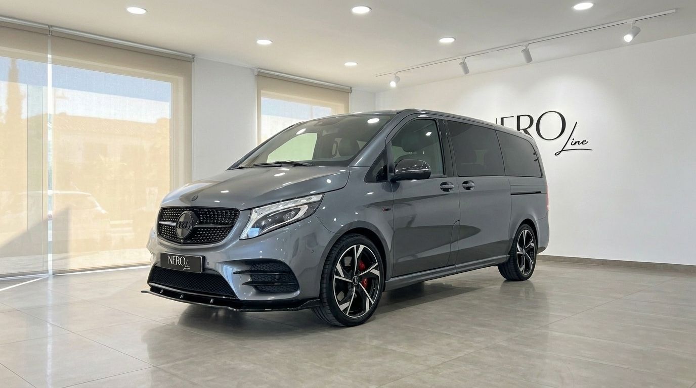 The gloss metallic Daytona Gray Mercedes-Benz V-Class 250d is showcased from a front three-quarter angle in a Benidorm showroom.