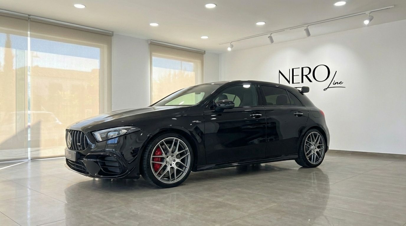 The black 2024 Mercedes-Benz A 45 S is showcased from a side-front angle in a modern showroom in Alicante.