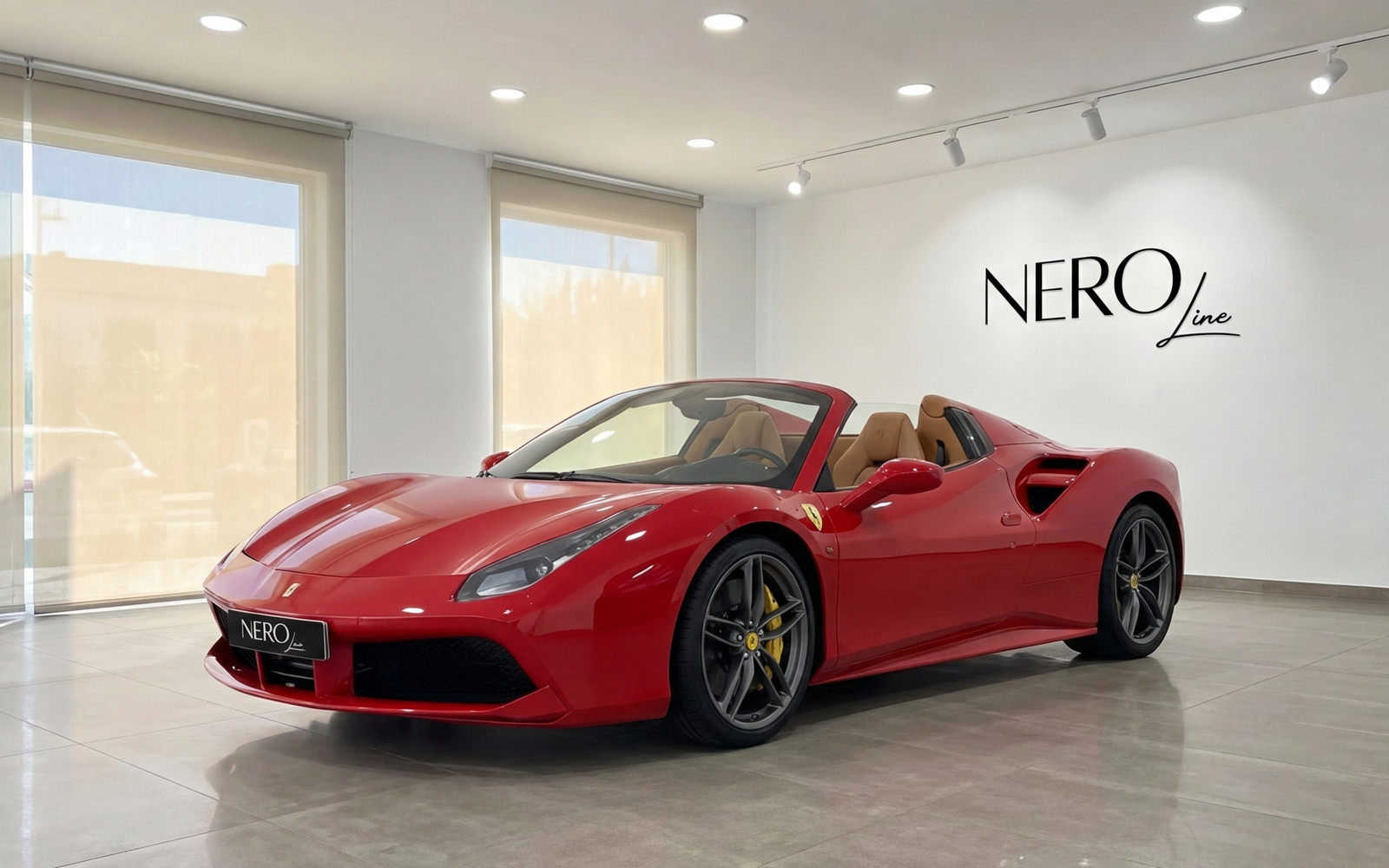 Ferrari 488 Spider — Showroom display in Mallorca The red Ferrari 488 Spider convertible is showcased in a modern showroom in Mallorca, featuring its open top and luxurious tan interior.