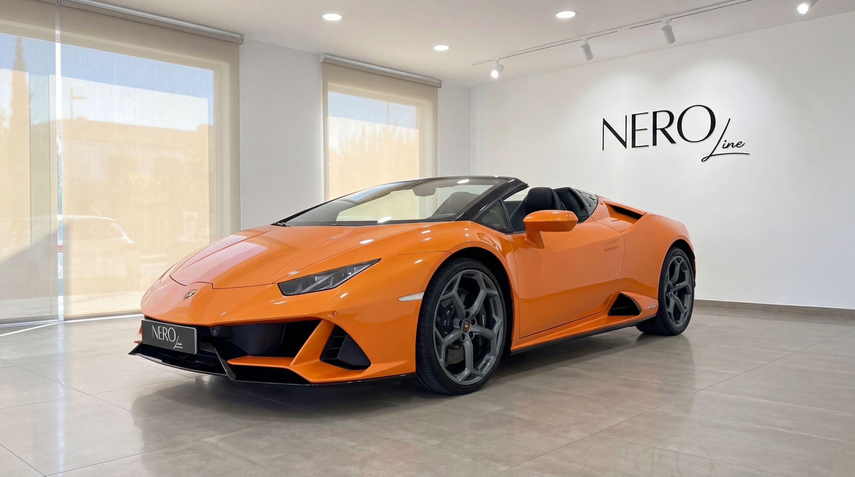 A vibrant orange Lamborghini Huracan Evo Spyder, convertible top down, is showcased in a modern Malaga showroom.