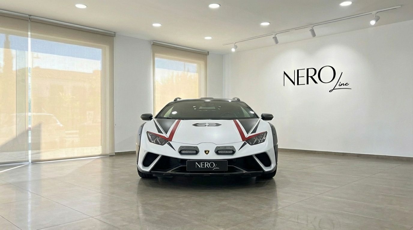 The white 2024 Lamborghini Huracán Sterrato with black and red racing stripes, seen from the front in a showroom in Madrid.