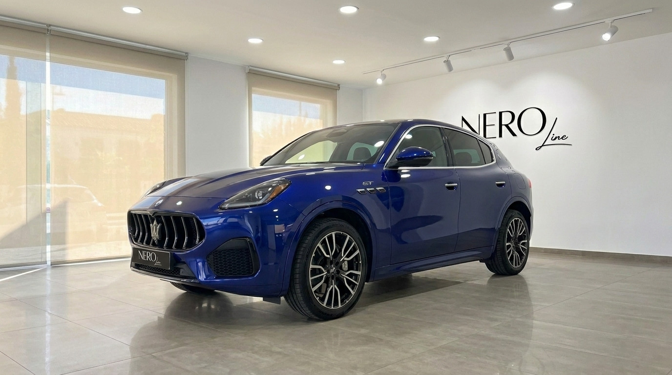 Maserati Grecale 2026 — Front view in Benidorm The metallic blue Maserati Grecale 2026 is prominently displayed from a front three-quarter angle inside a showroom in Benidorm.
