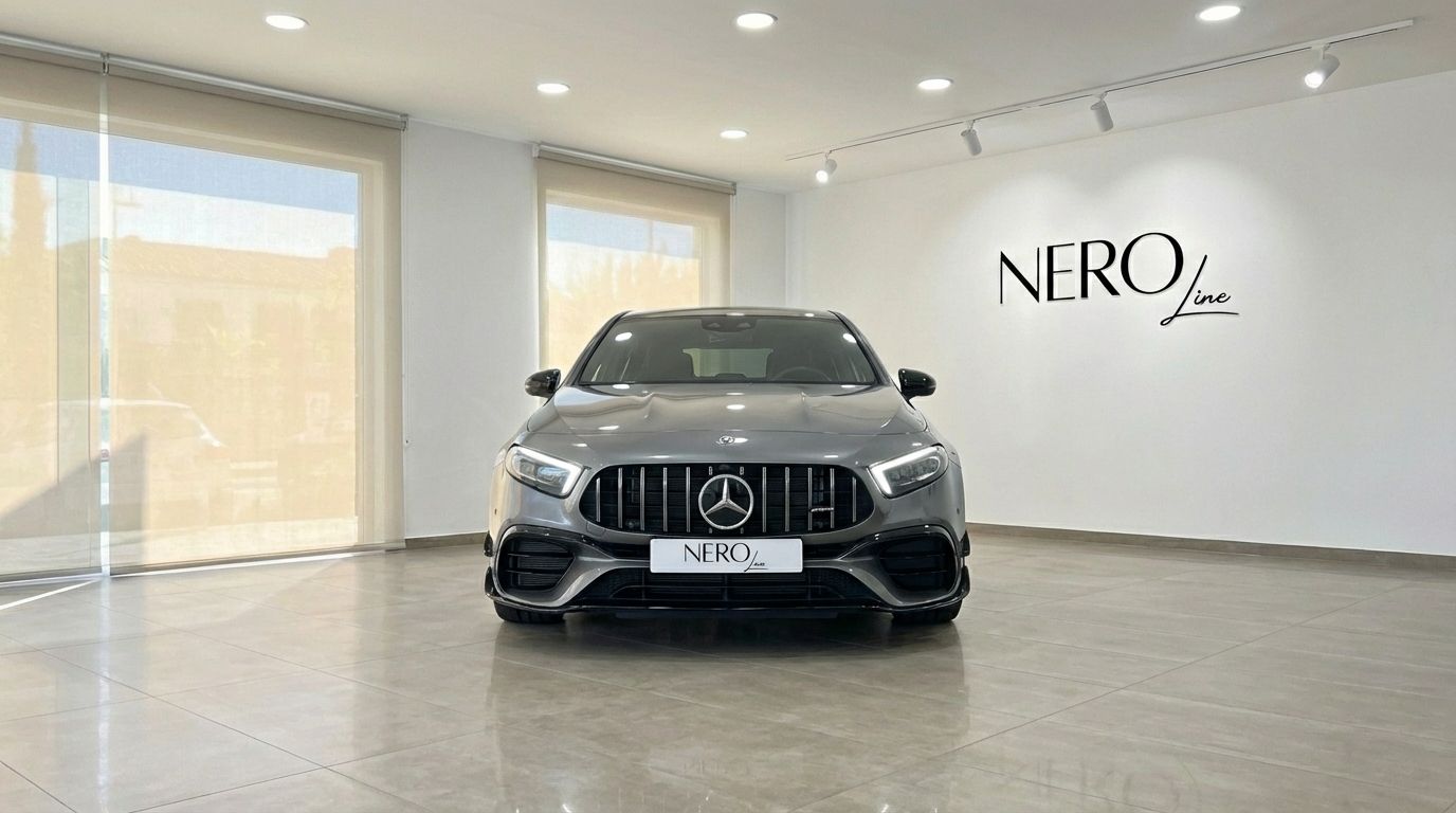 Front view of the metallic grey 2022 Mercedes-Benz A 45 AMG displayed in a showroom in Alicante with the NEROline logo.