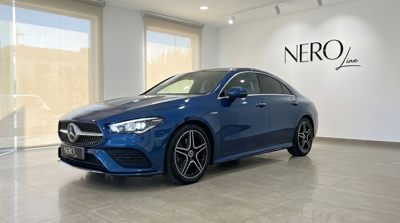 The blue 2022 Mercedes-Benz CLA is showcased from a front three-quarter angle in a bright showroom in Mallorca.