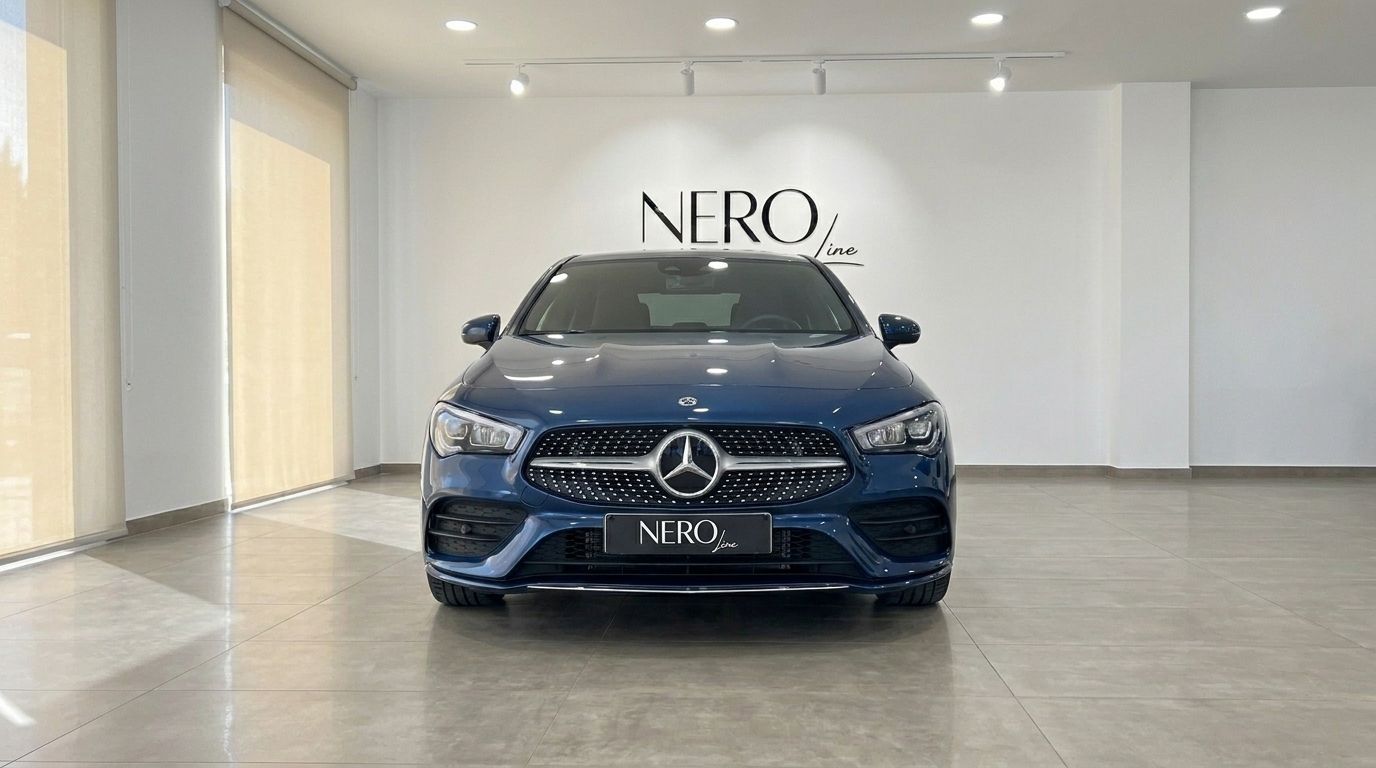 The 2022 Mercedes-Benz CLA in Gloss Metallic Blue is showcased from the front view in a bright showroom in Mallorca.