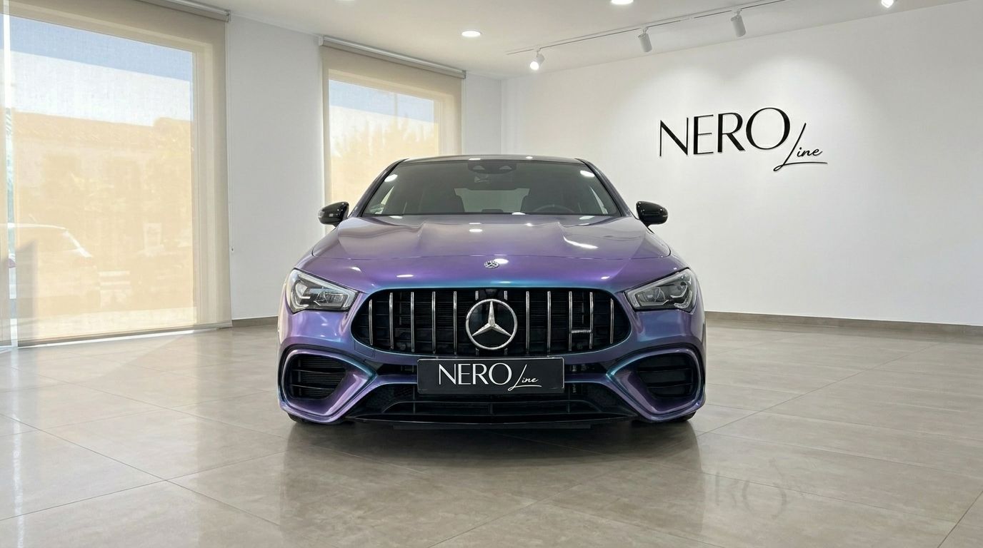 The iridescent purple Mercedes-Benz CLA 45 AMG 2021 is showcased from a front view in a showroom in Alicante.