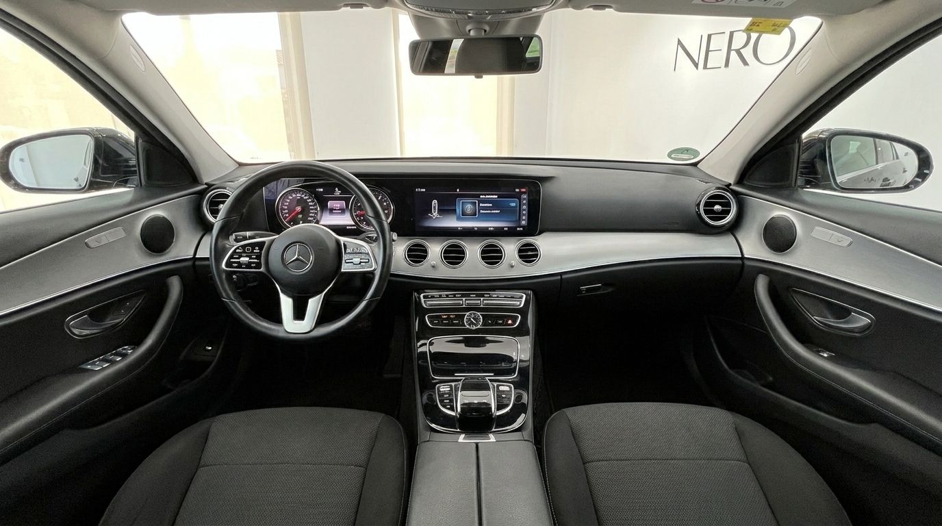 The luxurious interior cockpit and dashboard of the 2019 Mercedes-Benz E-Class, available for rent in Alicante.