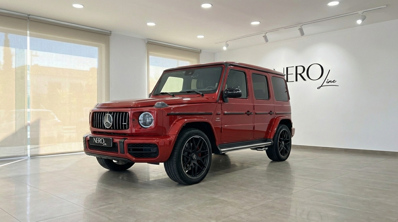 Mercedes-Benz G63 AMG — Showroom view Alicante The glossy red 2022 Mercedes-Benz G63 AMG performance SUV is showcased in a showroom in Alicante.