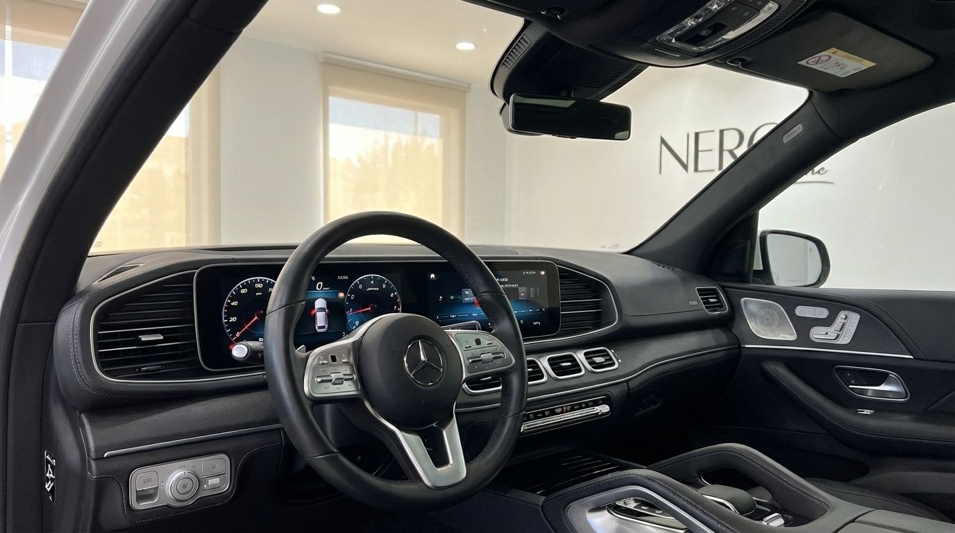 Mercedes-Benz GLE 350e AMG interior showing the dashboard, steering wheel, and infotainment screen in Alicante.