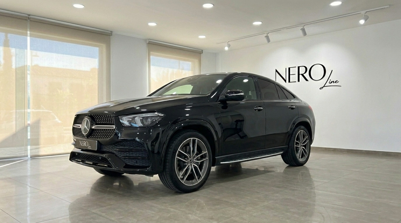 Mercedes-Benz GLE 450d — Front view Marbella The black 2024 Mercedes-Benz GLE 450d is showcased from a front three-quarter angle in a bright Marbella showroom.