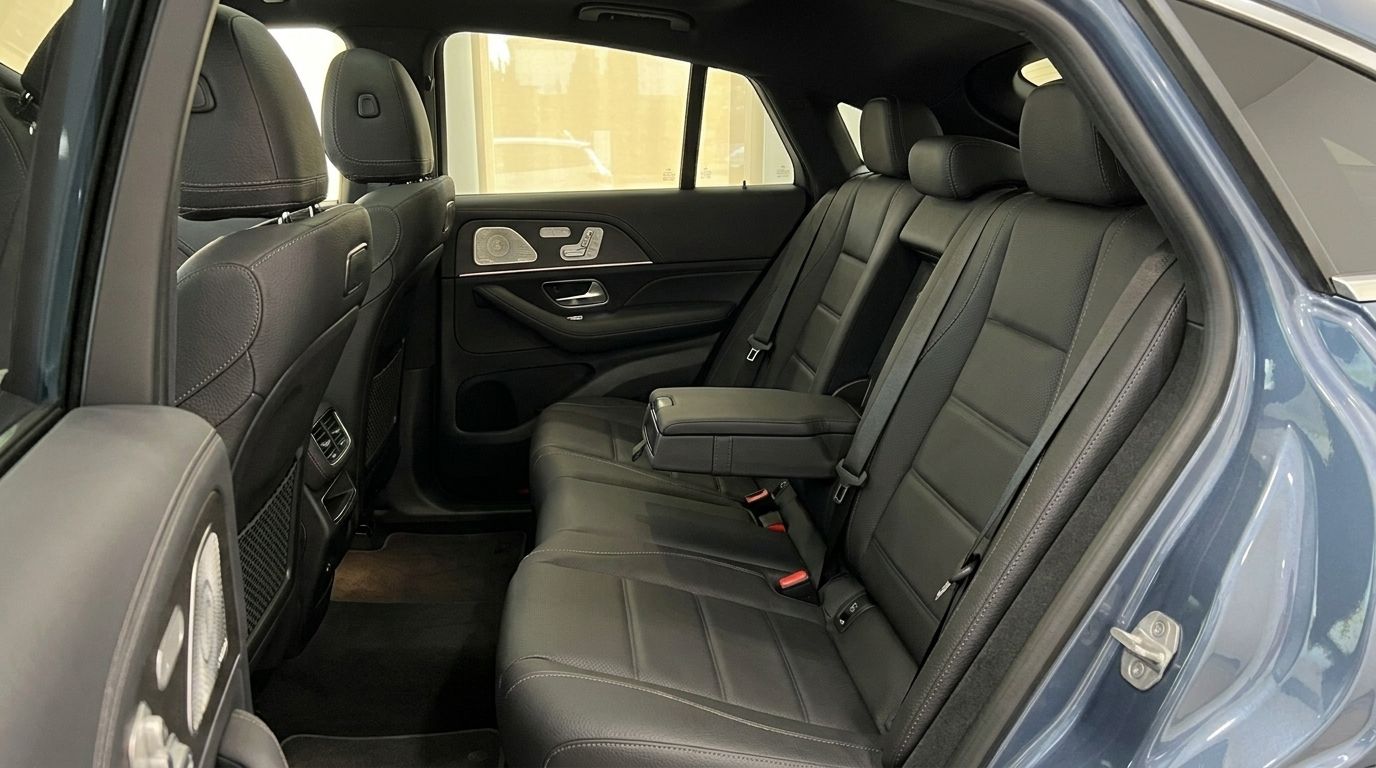 The luxurious black leather rear seats and interior of the Mercedes-Benz GLE Coupe in Mallorca are clearly visible.
