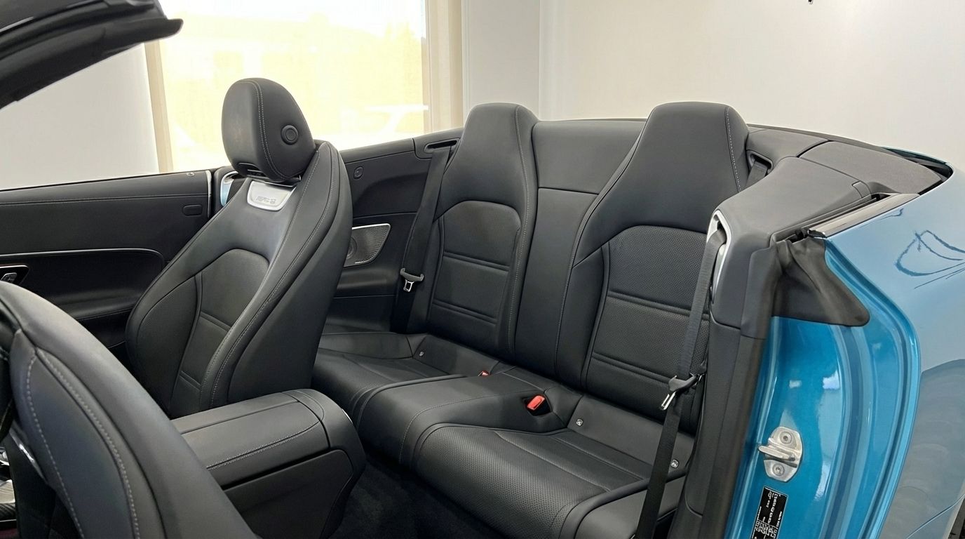 View of the Mercedes-Benz SL43 AMG Roadster's luxurious black leather rear seats and interior in Alicante.