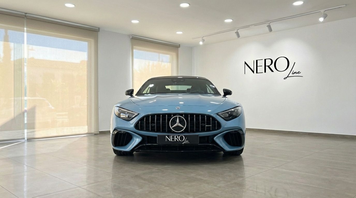 The baby blue 2024 Mercedes-Benz SL63 AMG is showcased frontally in a bright Alicante showroom.