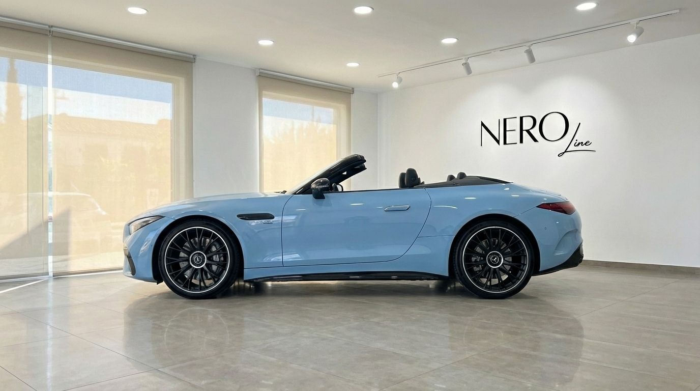The baby blue 2024 Mercedes-Benz SL63 AMG convertible, with its top down, is showcased in a showroom in Alicante.