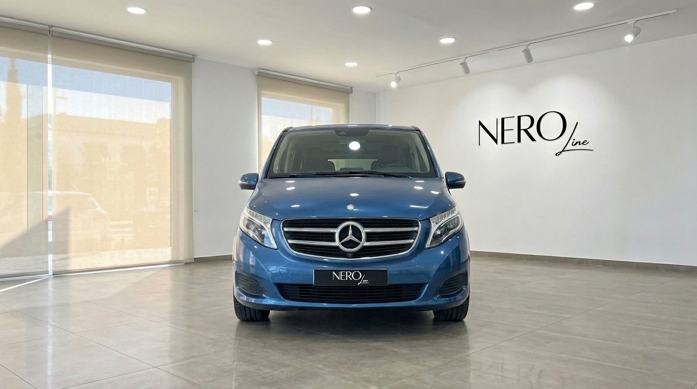 Front view of the metallic blue Mercedes-Benz V-Class 300d Extralang luxury van in a showroom in Mallorca.