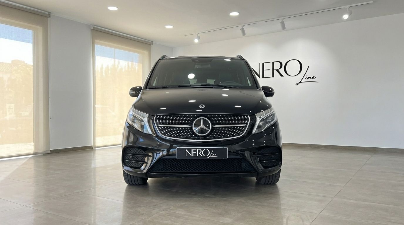 The front view of a black Mercedes-Benz V250d Avantgarde parked in a bright showroom with the NEROline logo in Marbella.