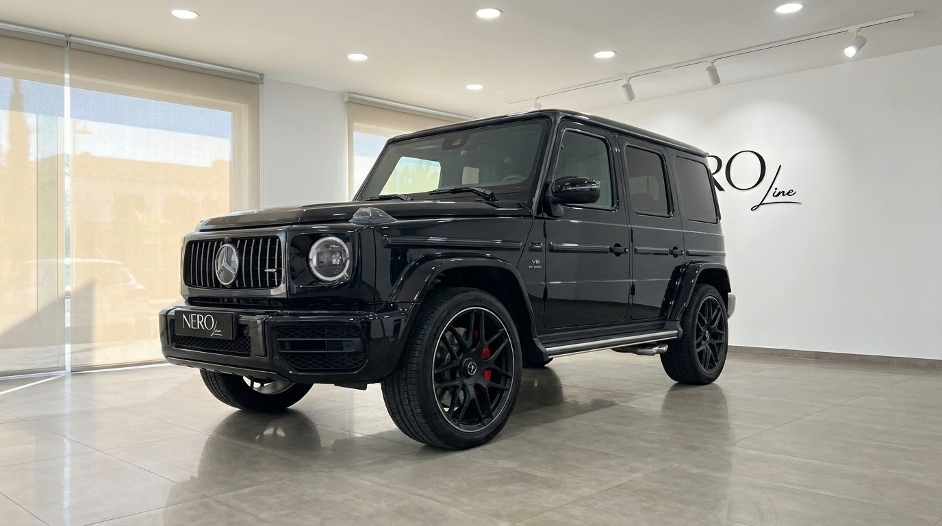 Mercedes G63 AMG — Luxury SUV in Madrid The glossy black 2025 Mercedes G63 AMG is showcased from a front three-quarter angle indoors in Madrid.